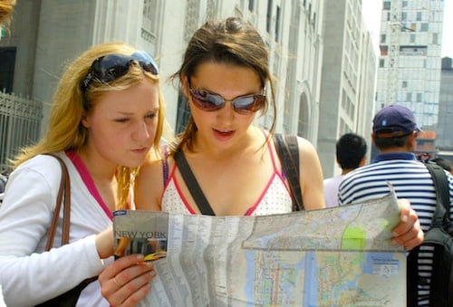 1._Two_girls_reading_map_of_NYC