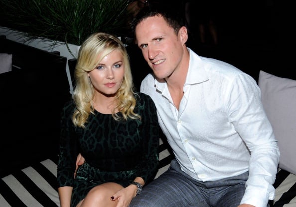 elisha cuthbert engaged hockey player